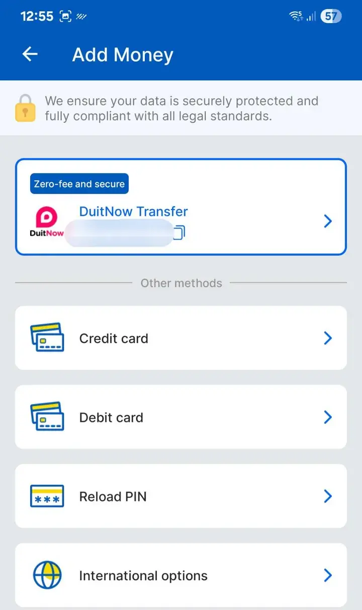 Mobile app screen showing ‘Add Money’ options including DuitNow Transfer, Credit card, Debit card, Reload PIN, and International options.