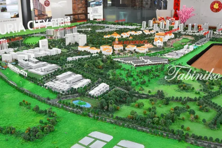 Architectural model of Sunsuria City in Malaysia showing residential towers, green spaces, and SENI Residence layout.