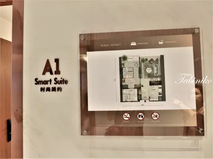 A1 Smart Suite floor plan showing 58 sqm layout with 1 bedroom, 1 bathroom, living, dining, and kitchen areas.
