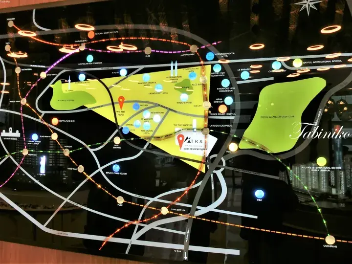 Illuminated location map of Kuala Lumpur highlighting TRX Core Residence, KLCC, and Bukit Bintang with transit lines.