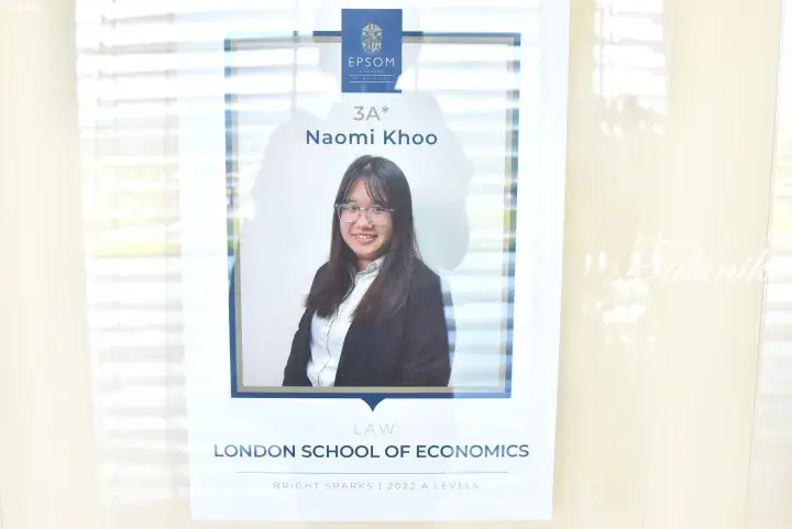 Poster celebrating Naomi Khoo’s 3A* A Level results from Epsom College in Malaysia, accepted to LSE for Law.