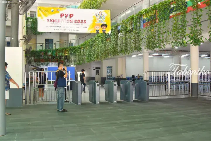 Entrance turnstiles at Fairview International School Kuala Lumpur during the PYP Exhibition 2023 event.
