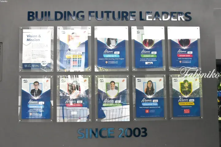 Sri KDU International School alumni display board showcasing graduates’ achievements and university placements since 2003.