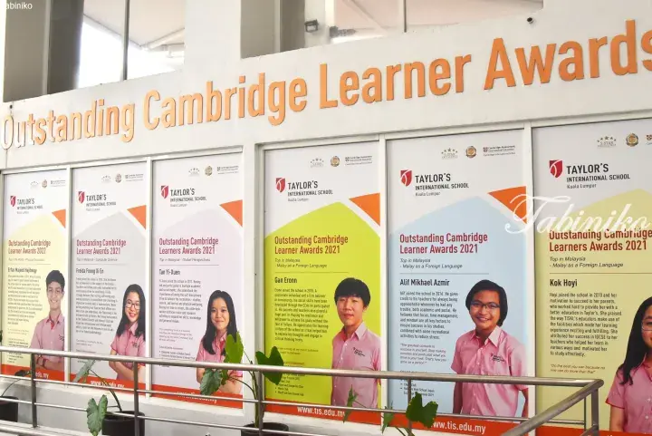 Posters displaying Outstanding Cambridge Learner Awards 2021 and 2022 winners at Taylor’s International School Kuala Lumpur.