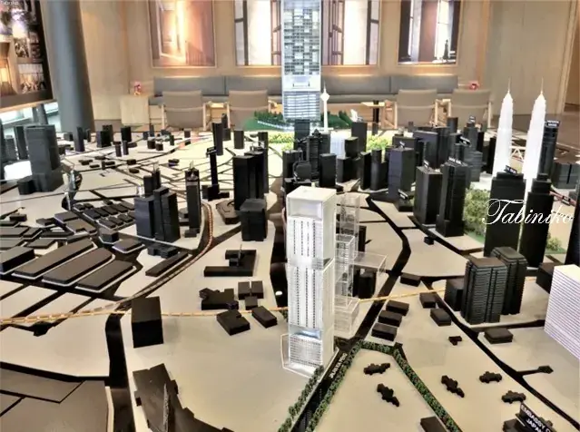 Architectural model of a high-rise development in Kuala Lumpur featuring the Petronas Twin Towers.