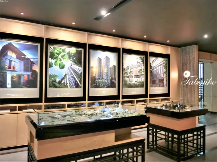 Interior display of luxury property models and architectural posters for Damansara Heights, St Mary, and Avira.