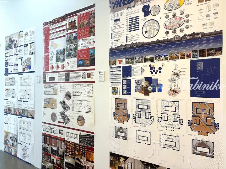 Architecture student project boards displaying floor plans, site analysis, and design concepts for a heritage building.
