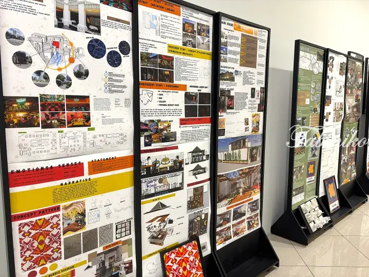 Architecture student project boards displaying floor plans, mood boards, and heritage preservation concepts.
