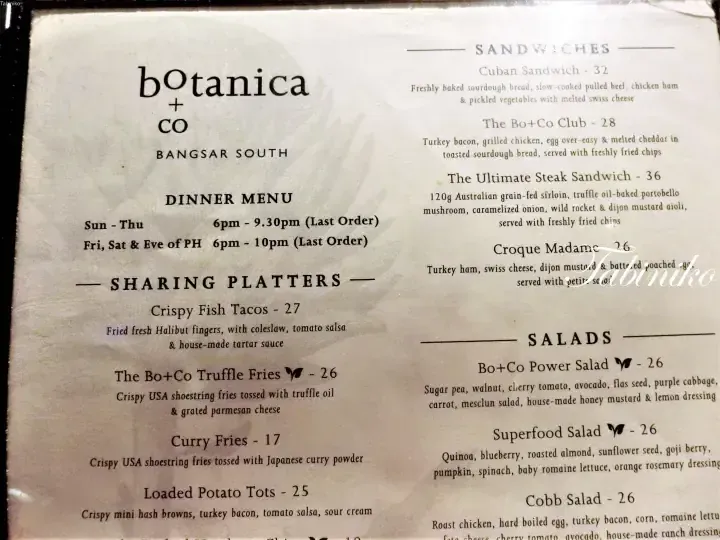 Botanica + Co dinner menu at Bangsar South featuring sharing platters, sandwiches, and salads with prices.