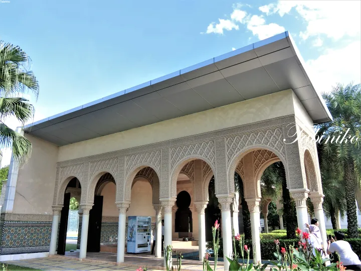 Ornate Moorish arches and columns at the entrance of the Blue Mosque in Kuala Lumpur, Malaysia.