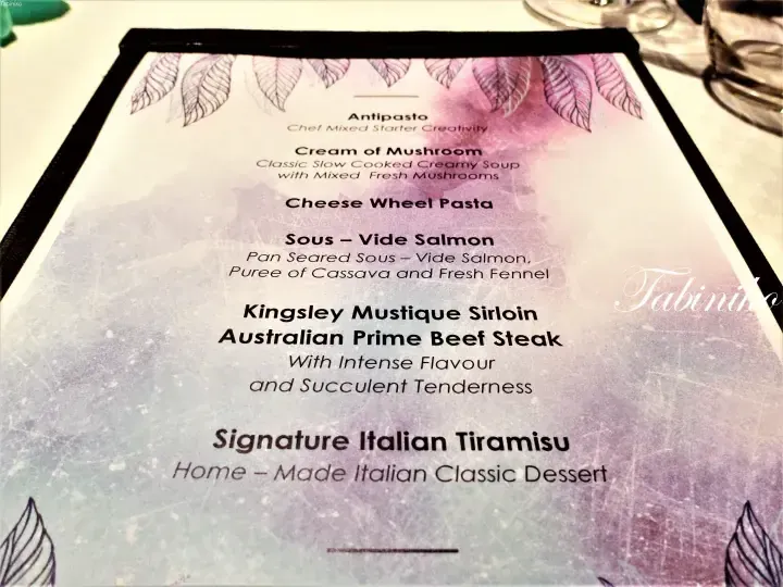 Menu featuring Kingsley Mustique Sirloin and Sous-Vide Salmon at a restaurant