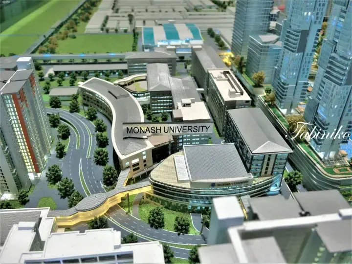 Architectural model of Monash University Malaysia campus featuring modern buildings and landscaped grounds