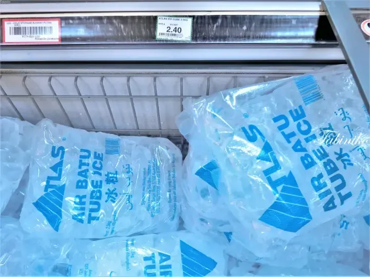 Bags of Atlas Tube Ice in a freezer at Cold Storage Sunway Putra Mall with a price tag of 2.40 MYR.